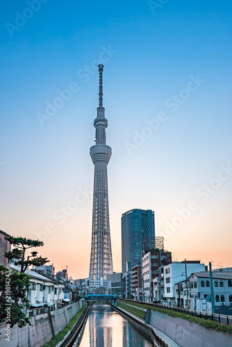 TOKYO, JAPAN - June 22, 2018: Tokyo Sky Tree, sunset and blue sky. Tokyo Sky Tree is one of the famous landmark in Tokyo. It is the tallest structure in world when built.