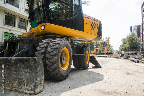 Excavator, hydraulics, tires, screws