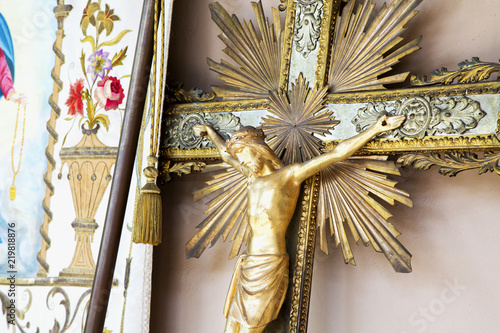 Wooden golden old crucifix
