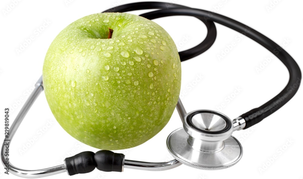 Stethoscope and Apple on a White Background Stethoscope and Apple on a White Background