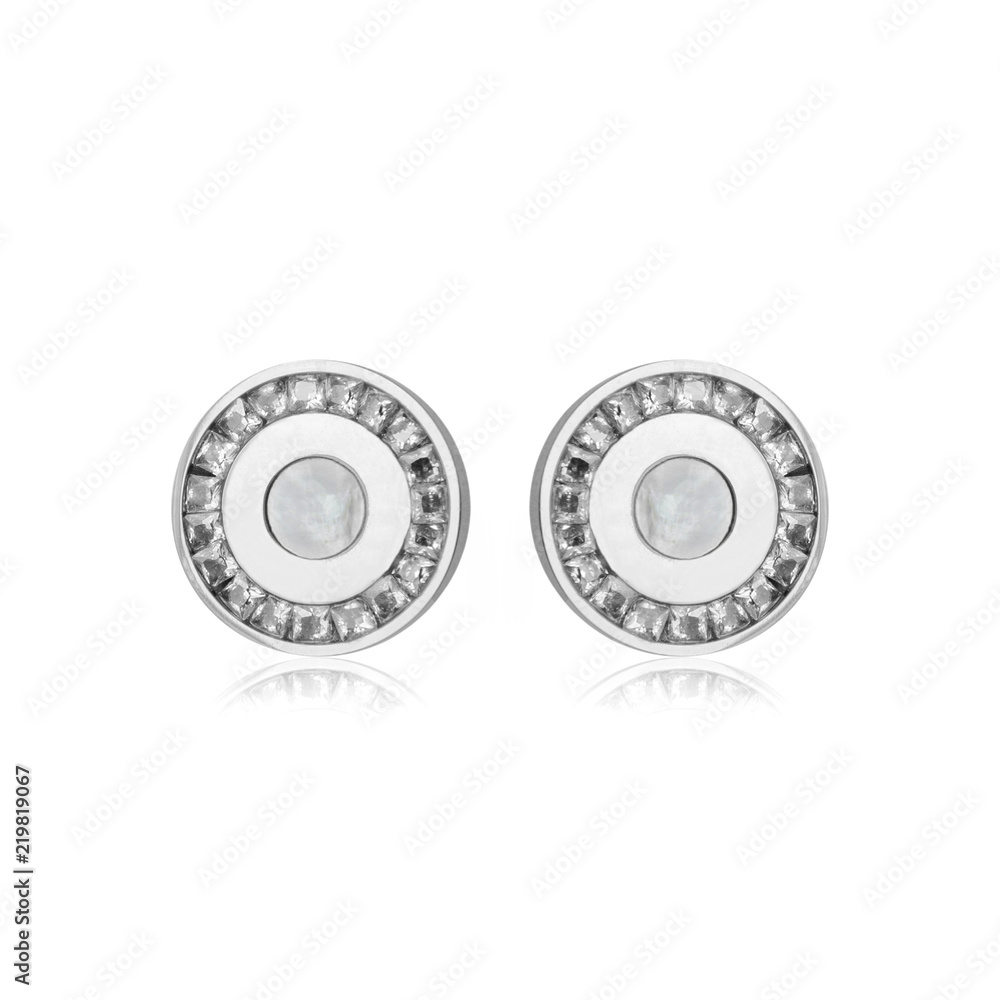 Pair of silver diamond earrings isolated on white Pair of silver diamond earrings isolated on white