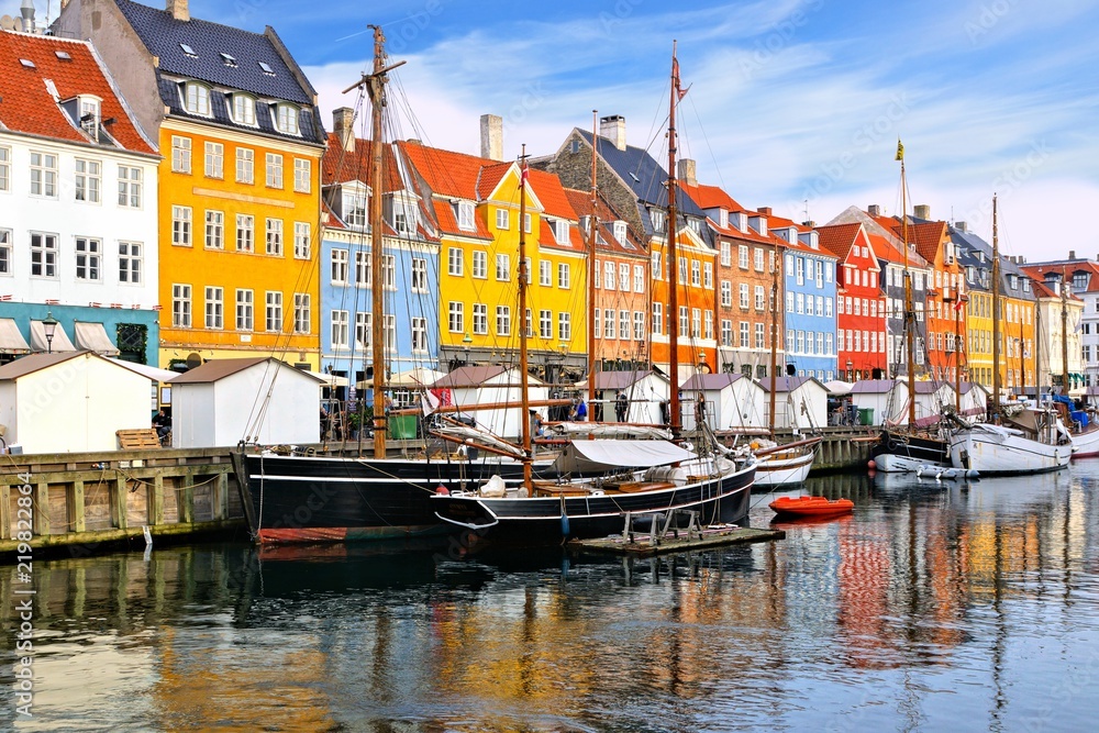 Colorful waterfront buildings and ships along the historic Nyhavn canal, Copenhagen, Denmark