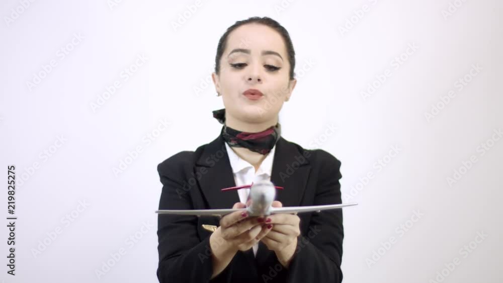 Beautiful stewardess. Studio shot with fly attendant woman. Beautiful stewardess. Studio shot with fly attendant woman.