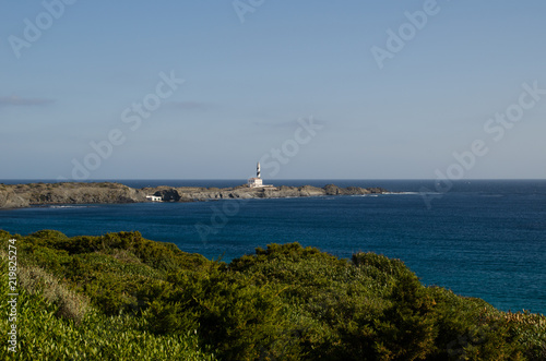 Landscape photography of one of the best known places in Menorca on the coast with a lighthouse. © miriam artgraphy