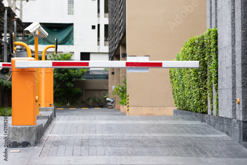 automatic security system with cctiv and metal bar barrier.