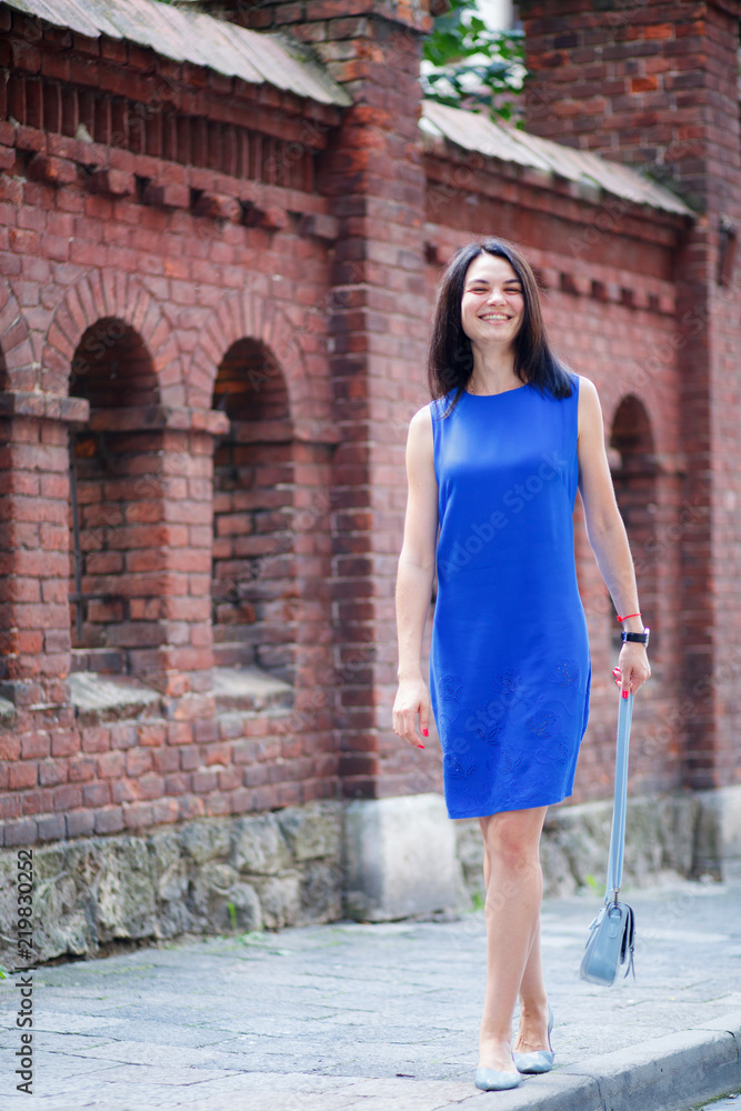 Portrait of a happy woman in the city