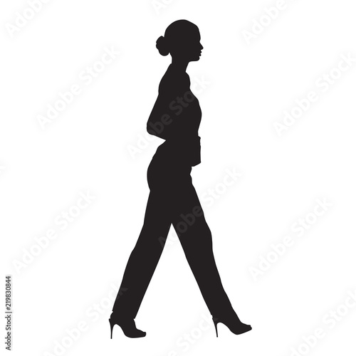 Business woman walking, side view, isolated vector silhouette