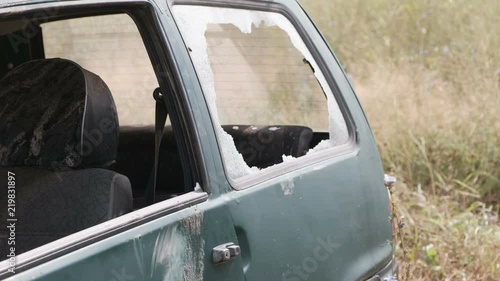 Car with broken Windows. Accident abandoned old car.
