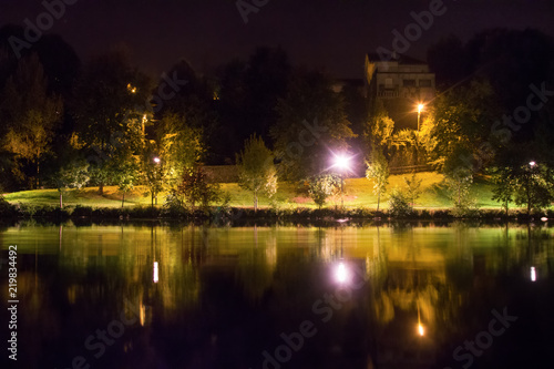 Limoges, France. Beauty of quiet pond and Park at night photo