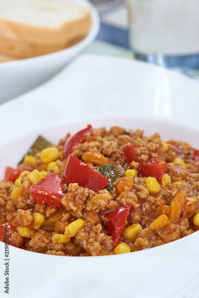 American food. Pasta alla genovese. Pasta with corn, fried meat and sauce. American food. Pasta alla genovese. Pasta with corn, fried meat and sauce.