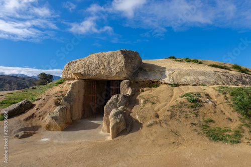 The Dolmen de Menga is in the Spanish town of Antequera (Malaga). It is a covered gallery dolmen and almost rectangular plant, dating from the 3rd millennium BCE. photo