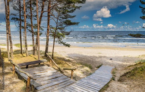 Wooden resting spot and footpath leading to a shore of the Baltic Sea, Jurmala, Latvia