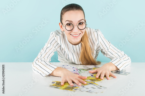Wallpaper Mural Attractive woman with cash