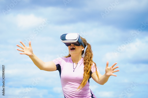 Woman wearing VR outside