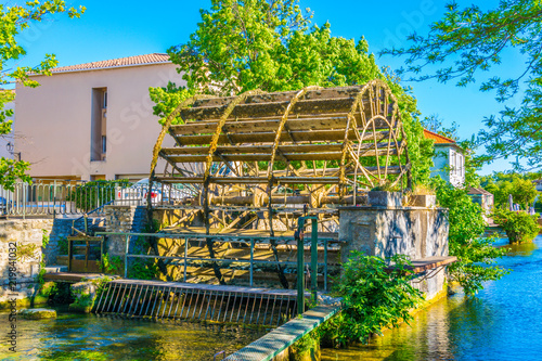 Water wheel in l'Isle sur la Sorgue in France photo