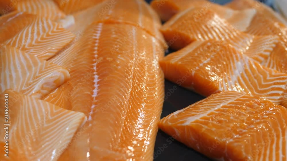 Close-Up Of Fresh Salmon Slices On Display In Supermarket