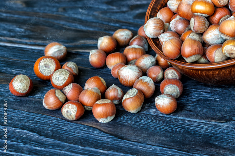 whole hazelnuts on the background of a wooden table whole hazelnuts on the background of a wooden table