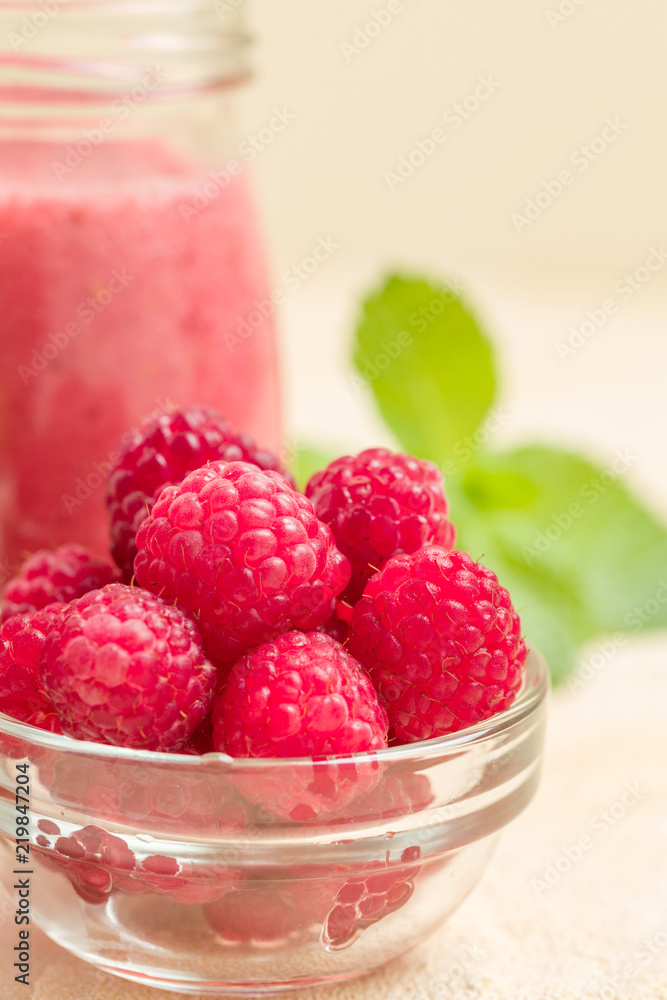 Raspberry smoothie close up photography with fresh summer blended cocktail and ripe berries. Raspberry smoothie close up photography with fresh summer blended cocktail and ripe berries.