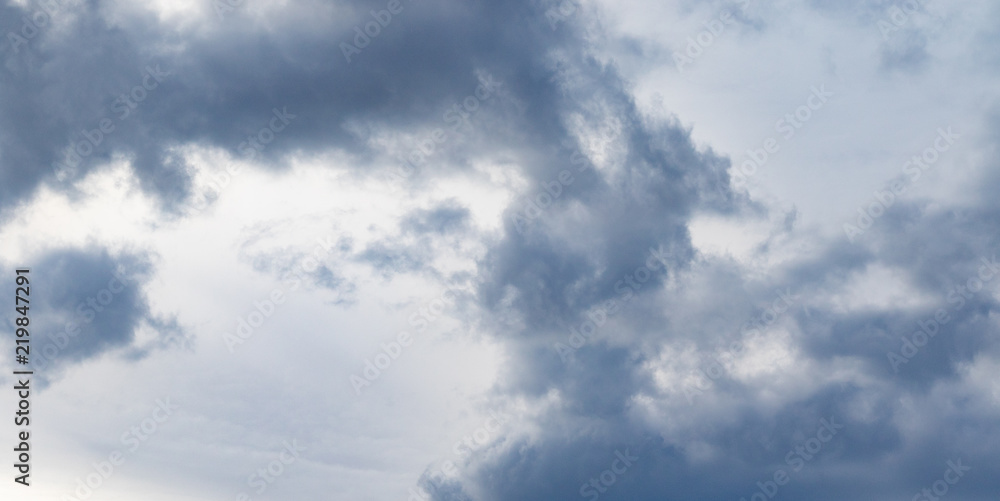 Grey clouds at the sky in evening Grey clouds at the sky in evening