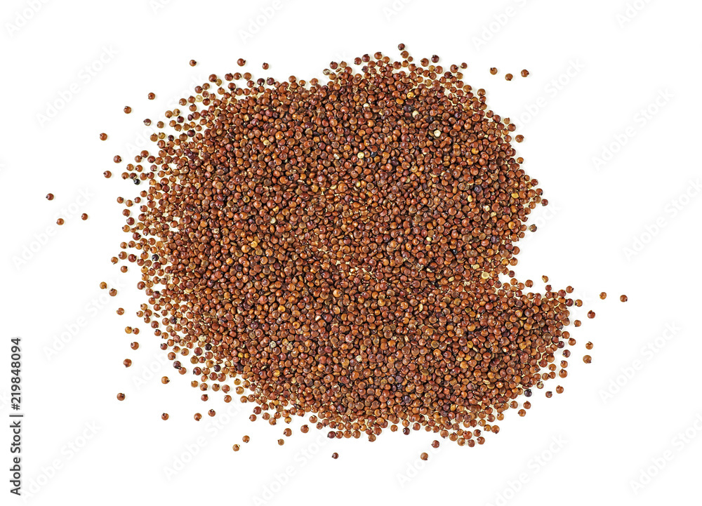 red quinoa seeds on white background, top view. red quinoa seeds on white background, top view.