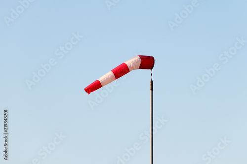 Anemometer or windsock on a mast