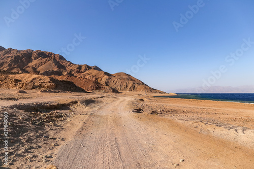 Sand road near the costline of Red Sea in Dahab. Egypt