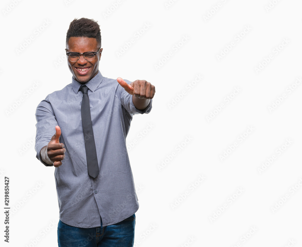 Young african american business man over isolated background approving doing positive gesture with hand, thumbs up smiling and happy for success. Looking at the camera, winner gesture. Young african american business man over isolated background approving doing positive gesture with hand, thumbs up smiling and happy for success. Looking at the camera, winner gesture.