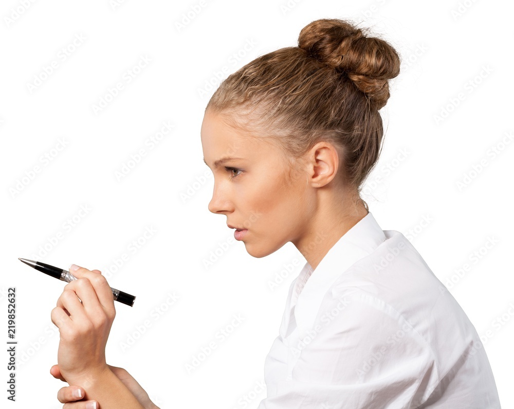 Beautiful young businesswoman focusing on invisible object Beautiful young businesswoman focusing on invisible object