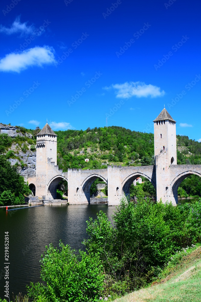 The medieval Pont Valentre crossing the Lot River in Cahors, France