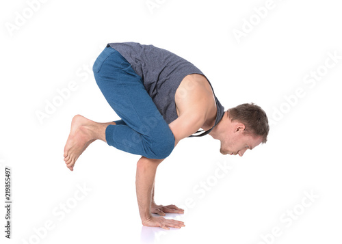 Young man practicing yoga. Yoga. Yoga Instructor