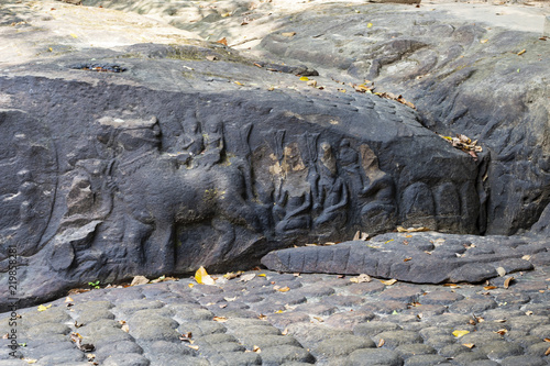 Ancient stone bas-relief, Kbal Spean monument, Cambodia. Traditional khmer stone carving on ancient hindu sacred place photo