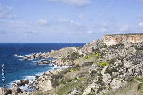 agriculture,ancient,animal,architecture,background,blue,bright,building,church,countryside,culture,day,europe,field,fields,flowers,green,hill,hilltop,historic,history,house,landscape,malta,nature,old,