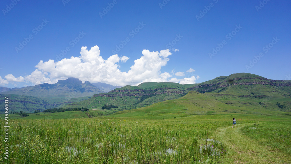 Rich nature with grass and mountains, clouds, in Drakensberg Giant Castle, South Africa Rich nature with grass and mountains, clouds, in Drakensberg Giant Castle, South Africa