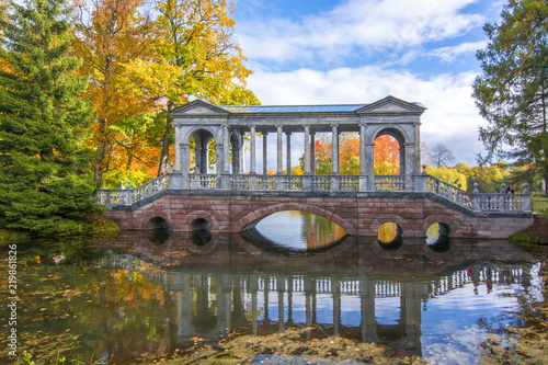 Marble bridge in golden fall in Catherine park, Tsarskoe Selo, Saint Petersburg, Russia