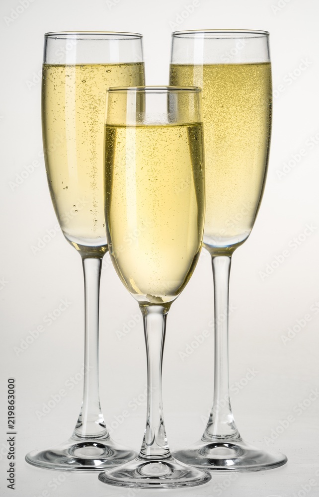 Champagne flutes filled with champagne Champagne flutes filled with champagne