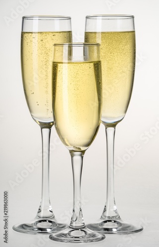 Champagne flutes filled with champagne
