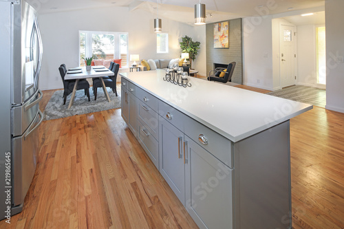 Stunning kitchen design with grey cabinets.