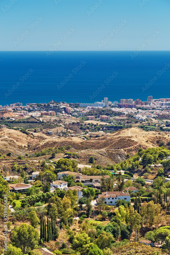 panoramic view of valley and sea