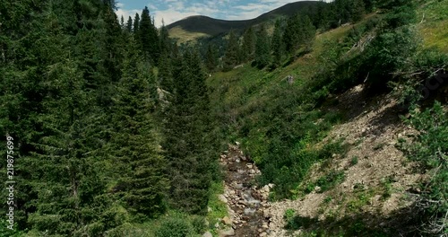 Drone flight in summer over mountain stream in the Nockberge mountains in the Thunder Gorge in Carinthia in innerkrems, lungau, schoenfeld photo