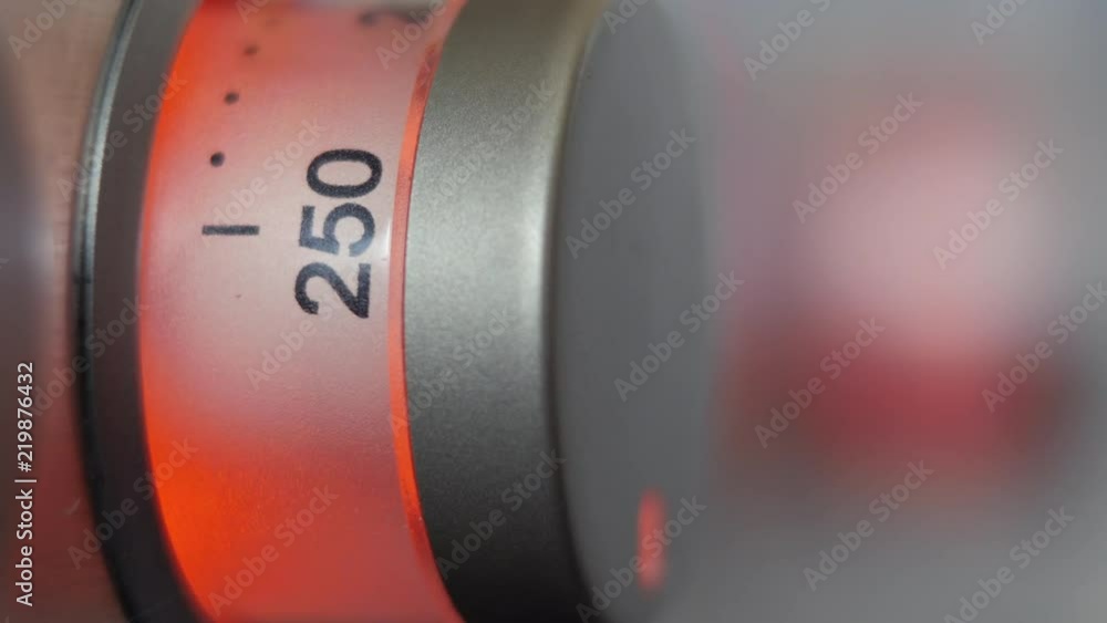 Male Fingers Turning Electric Stove Knob Male Fingers Turning Electric Stove Knob