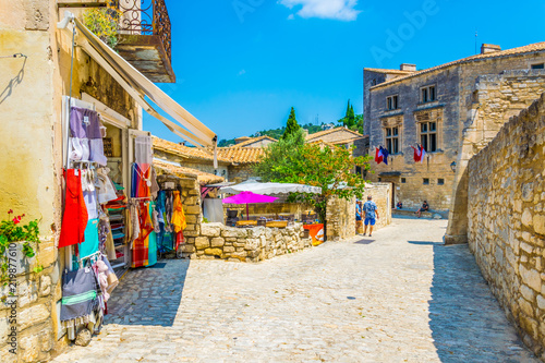 Fototapeta Naklejka Na Ścianę i Meble -  View of a narrow street in the historical center of Les Baux de Provence, France