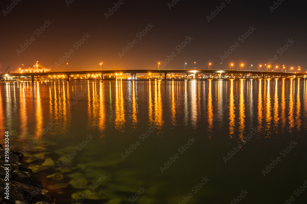 Tauranga Harbour Bridge and surrounds illuminates night sky and harbour