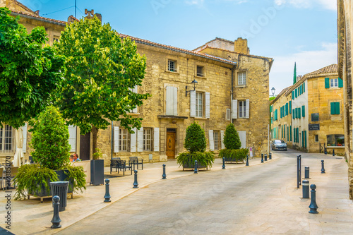 View of a narrow street in the center of Villeneuve les Avignon, France photo