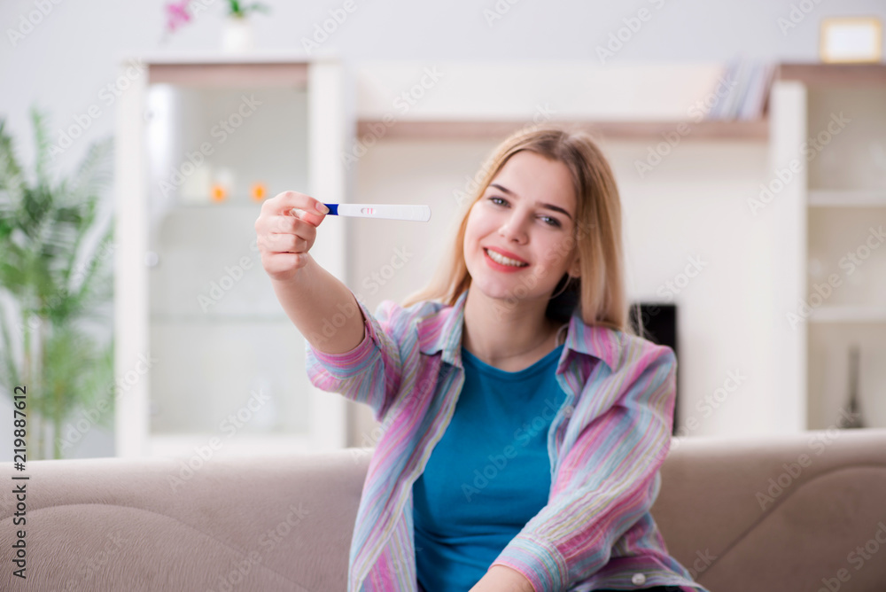 Young woman finding out about her pregnancy Young woman finding out about her pregnancy