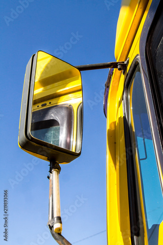 Mirrors of a lorry on a sky background photo