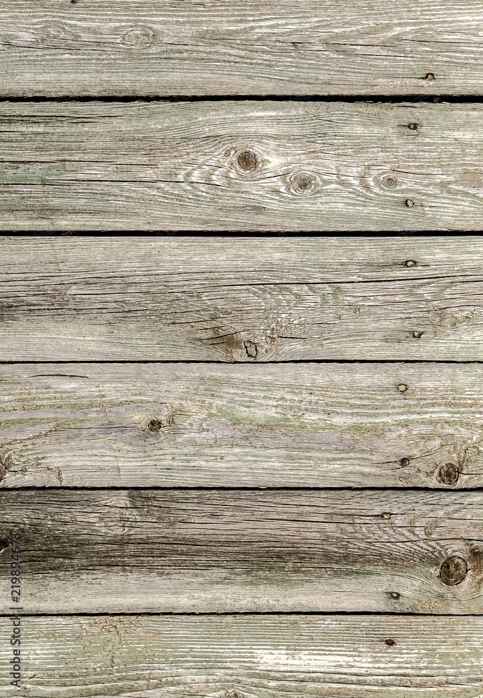 Old wooden planks in a fence as an abstract background Old wooden planks in a fence as an abstract background