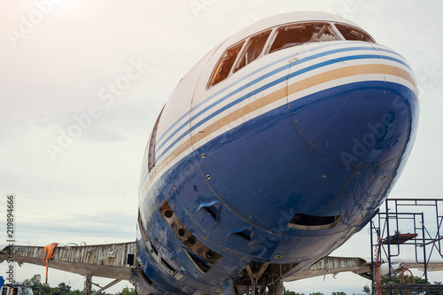 Old decommissioned airplanes and airplane details in a scrap metal yard,the structure of the old aircraft. © visoot