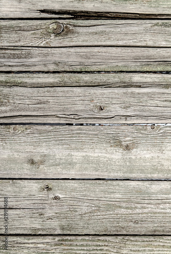 Old wooden planks in a fence as an abstract background