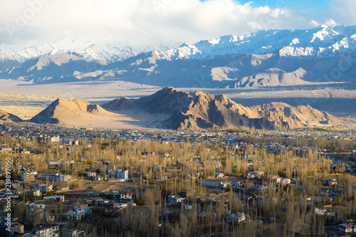 The city of Leh,  Leh city is located in the Indian Himalayas at an altitude of 3500 meters.  viewed from Leh Palace © Akarat Phasura