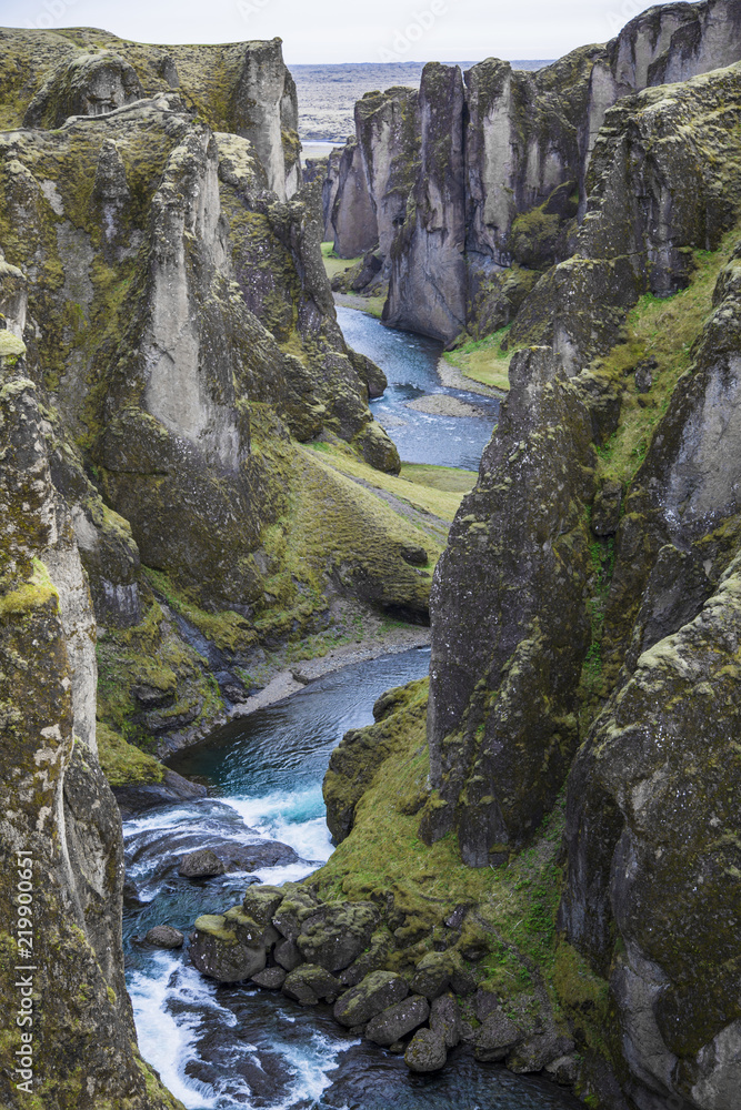 Iceland Canyon Fjaðrárgljúfur with river running through